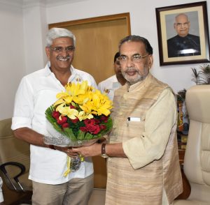 Union Minister for Agriculture and Farmers Welfare Radha Mohan Singh greeting new MoS Gajendra Singh Shekhawat